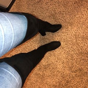 thigh high black boots!